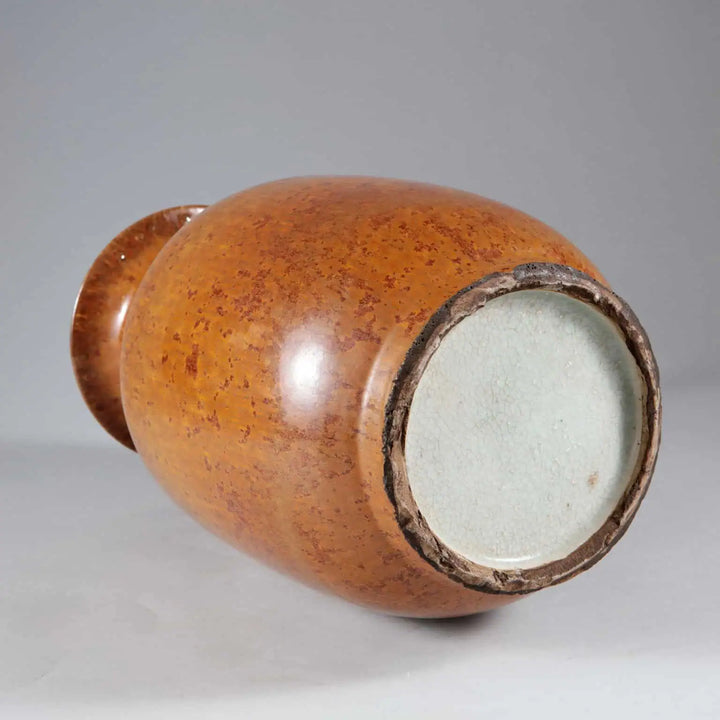 Monochrome Brown Glazed Lamp showing bottom view with smooth, shiny brown glaze and round base details.
