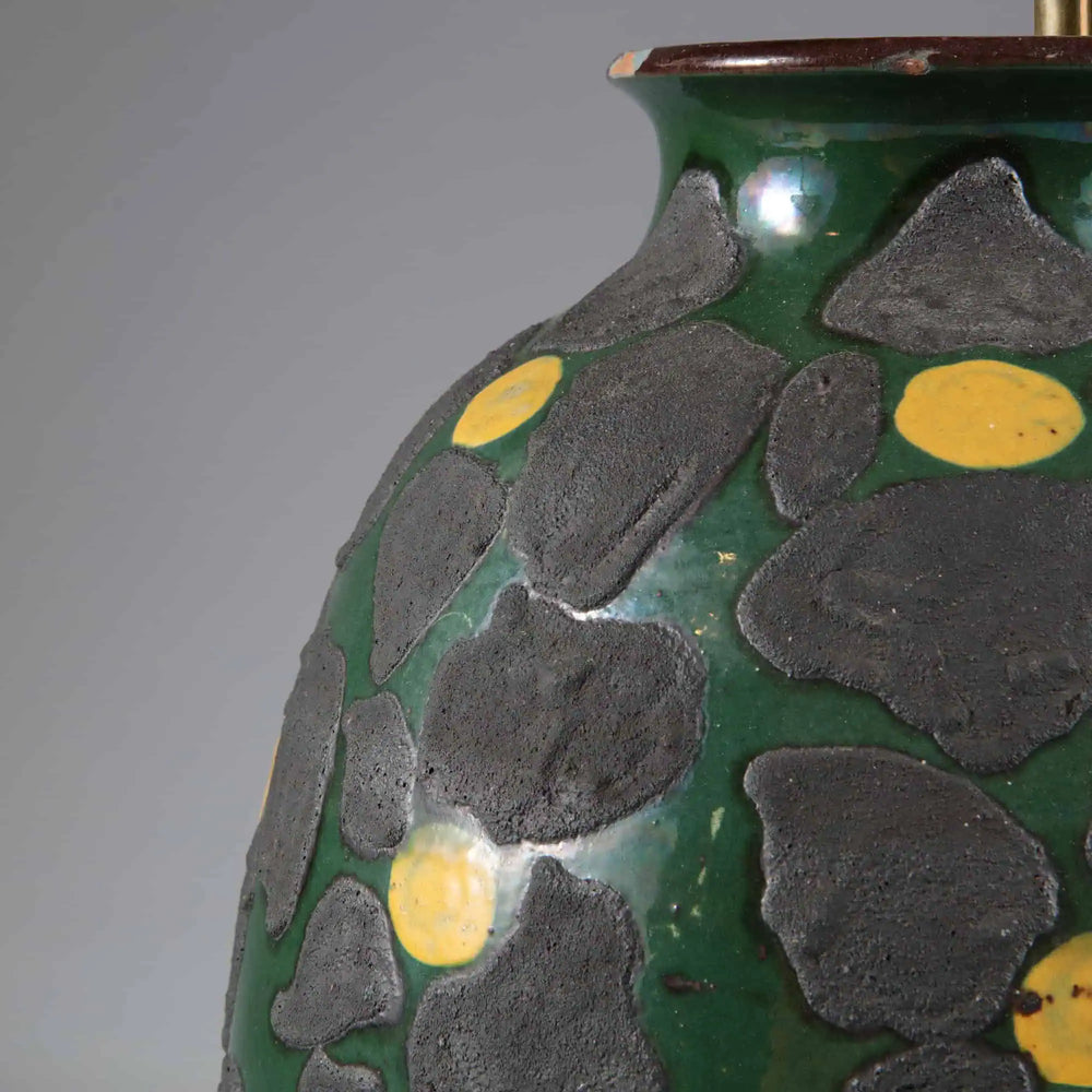 Green Glazed Lamp with Charcoal Dots and Yellow Accents featuring textured charcoal and yellow dots on glossy green base.