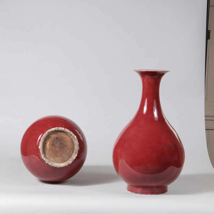 Pair of Meiping Sang de Boeuf Table Lamps with deep red porcelain glaze, elegant bottle vase design, China origin.