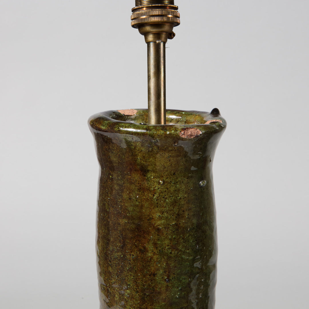 Pair of Green Glazed Bottle Vases as Table Lamps with tall green pottery bottle bases and incised pattern details.