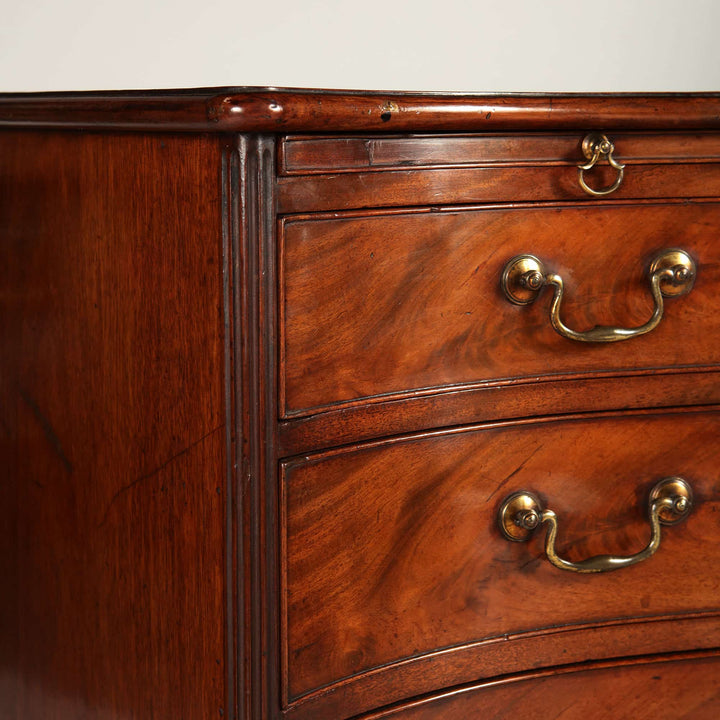 Fine George III Chippendale Chest Of Drawers with original gilt handles and flame mahogany veneer, circa 1760 English antique.