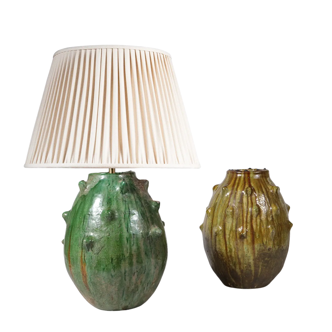 Spiked Green bottle Vase as a Table Lamp with green spiked ceramic base and cream pleated lampshade.