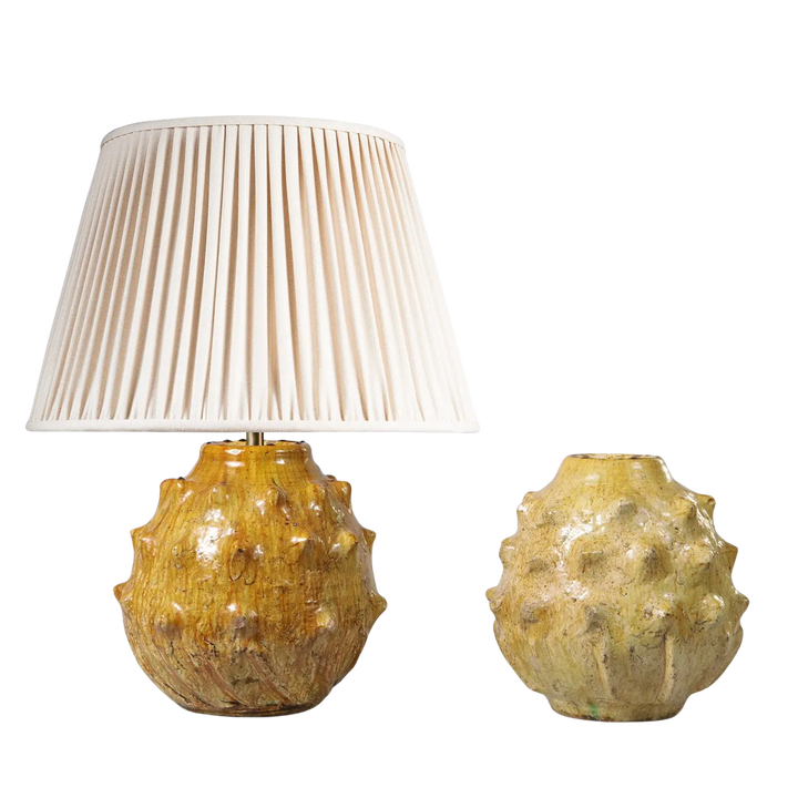 Spiked Green bottle Vase as a Table Lamp with textured spiked design and cream pleated lampshade, decorative home lighting.