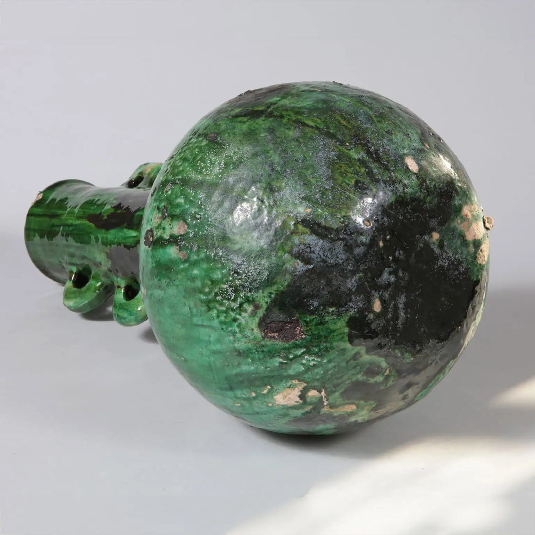 Green Glazed Pottery Bottle Vase as a Table Lamp shown from base with green and black glaze finish.