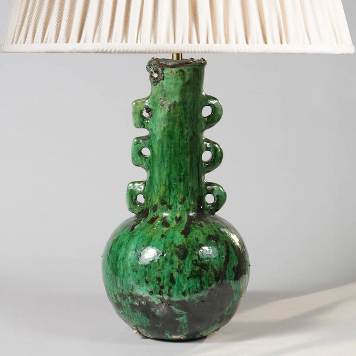 Green Glazed Pottery Bottle Vase as a Table Lamp with a unique textured design and cream lampshade.