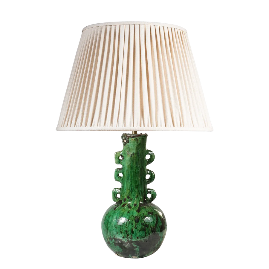 Green Glazed Pottery Bottle Vase as a Table Lamp with a pleated beige lampshade and unique bottle-shaped base.
