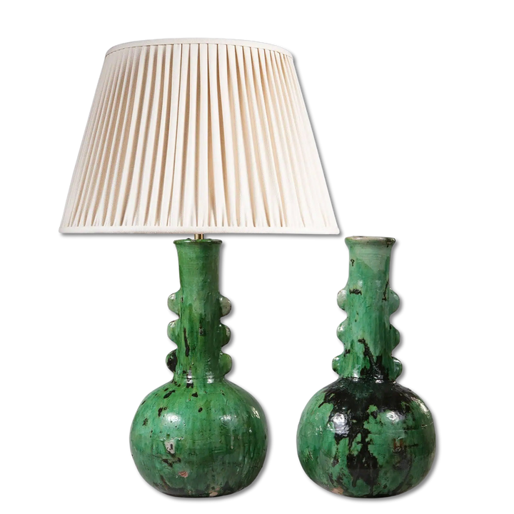 Pair of Green Glazed Bottle Vases as Table Lamps with textured green finish and cream pleated lampshade, 60 cm height.