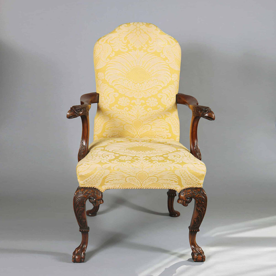 A walnut open armchair, George I style