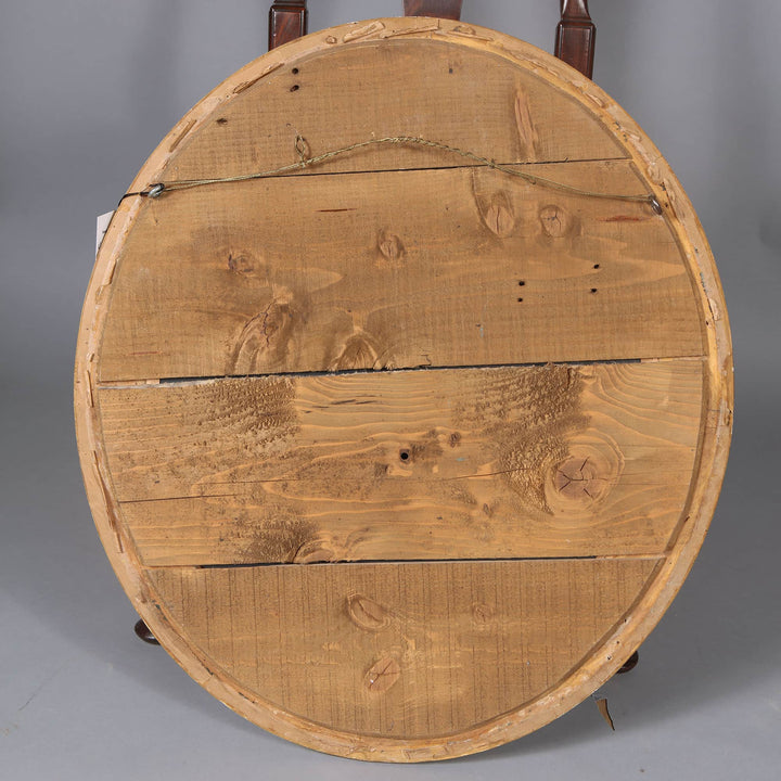 Pair of Victorian Giltwood Oval Wall Mirrors showing back view of wooden frame and hanging wire.