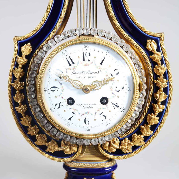 Ormolu Mounted and Jewelled Porcelain Clock Garniture