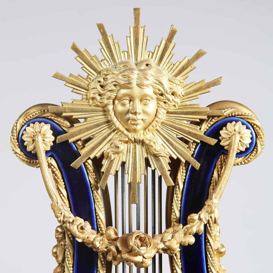 Ormolu Mounted and Jewelled Porcelain Clock Garniture