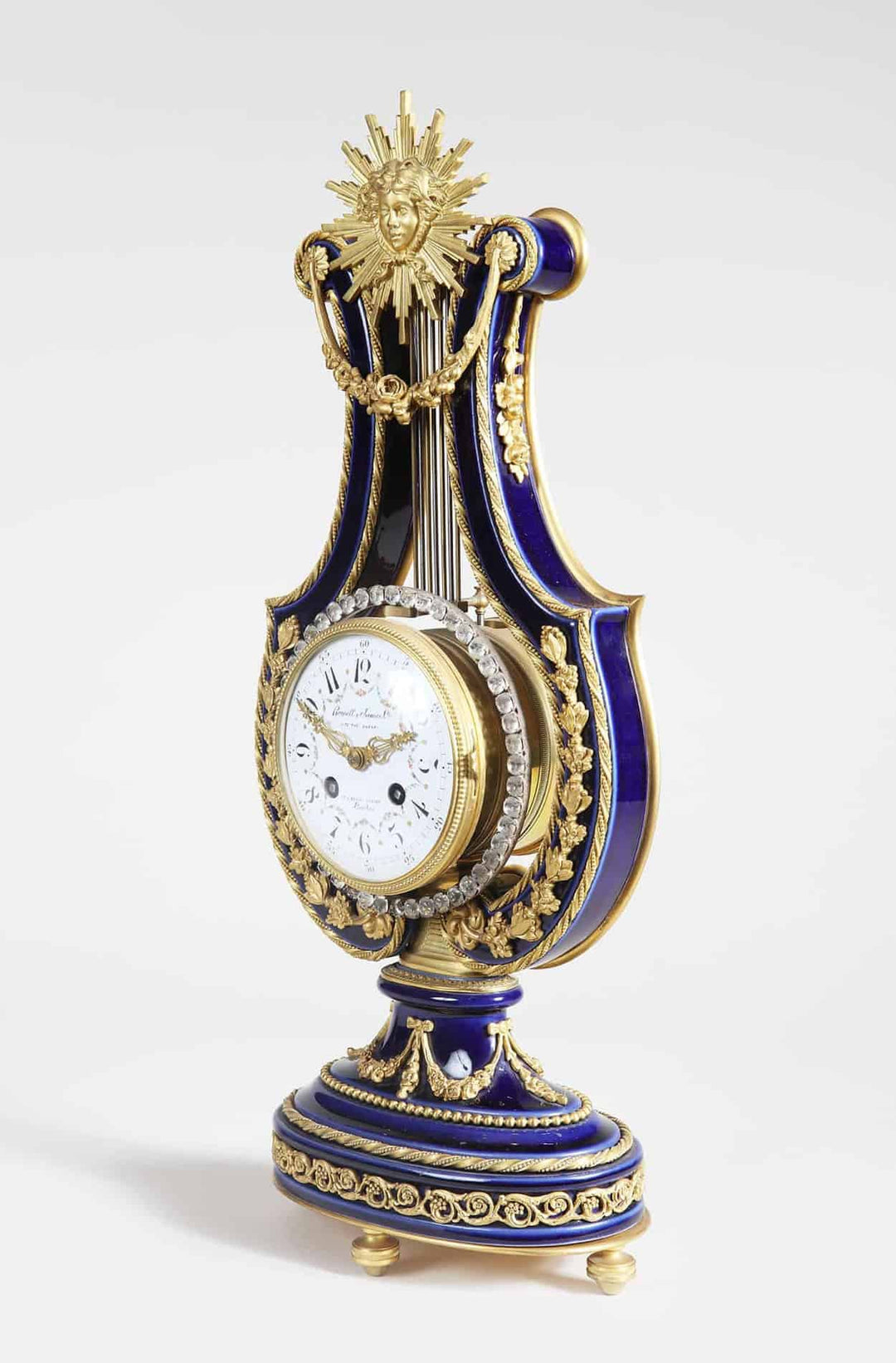 Ormolu Mounted and Jewelled Porcelain Clock Garniture