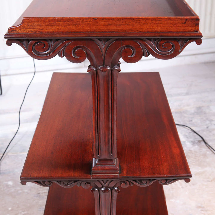 William IV Mahogany Etagere with intricate carved details and three polished wooden tiers circa 1840 England