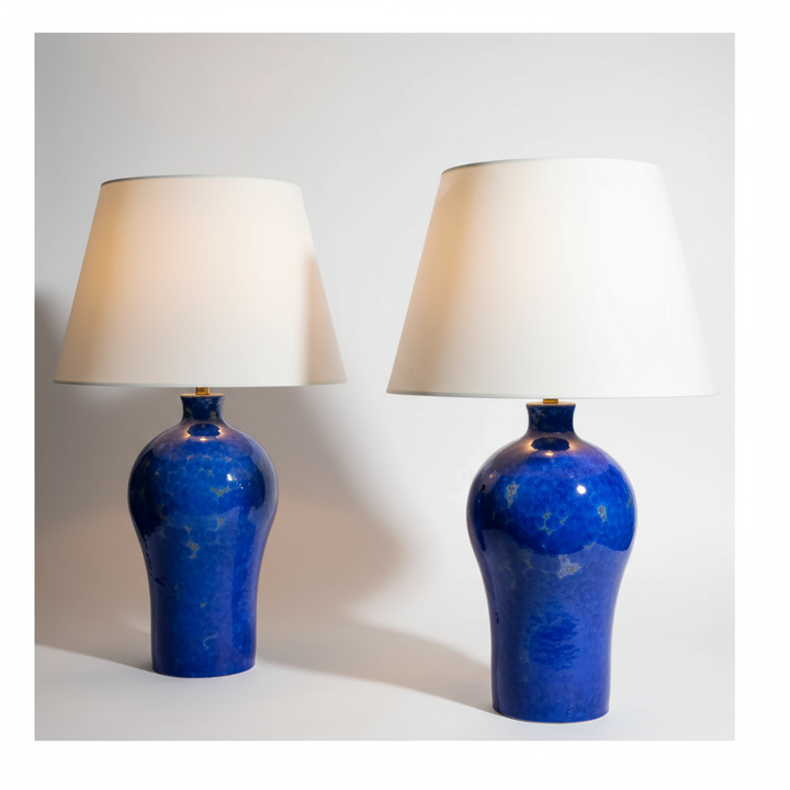 Pair of blue crystalline glazed vase lamps with white shades by Nicholas Wells Antiques in elegant ceramic design