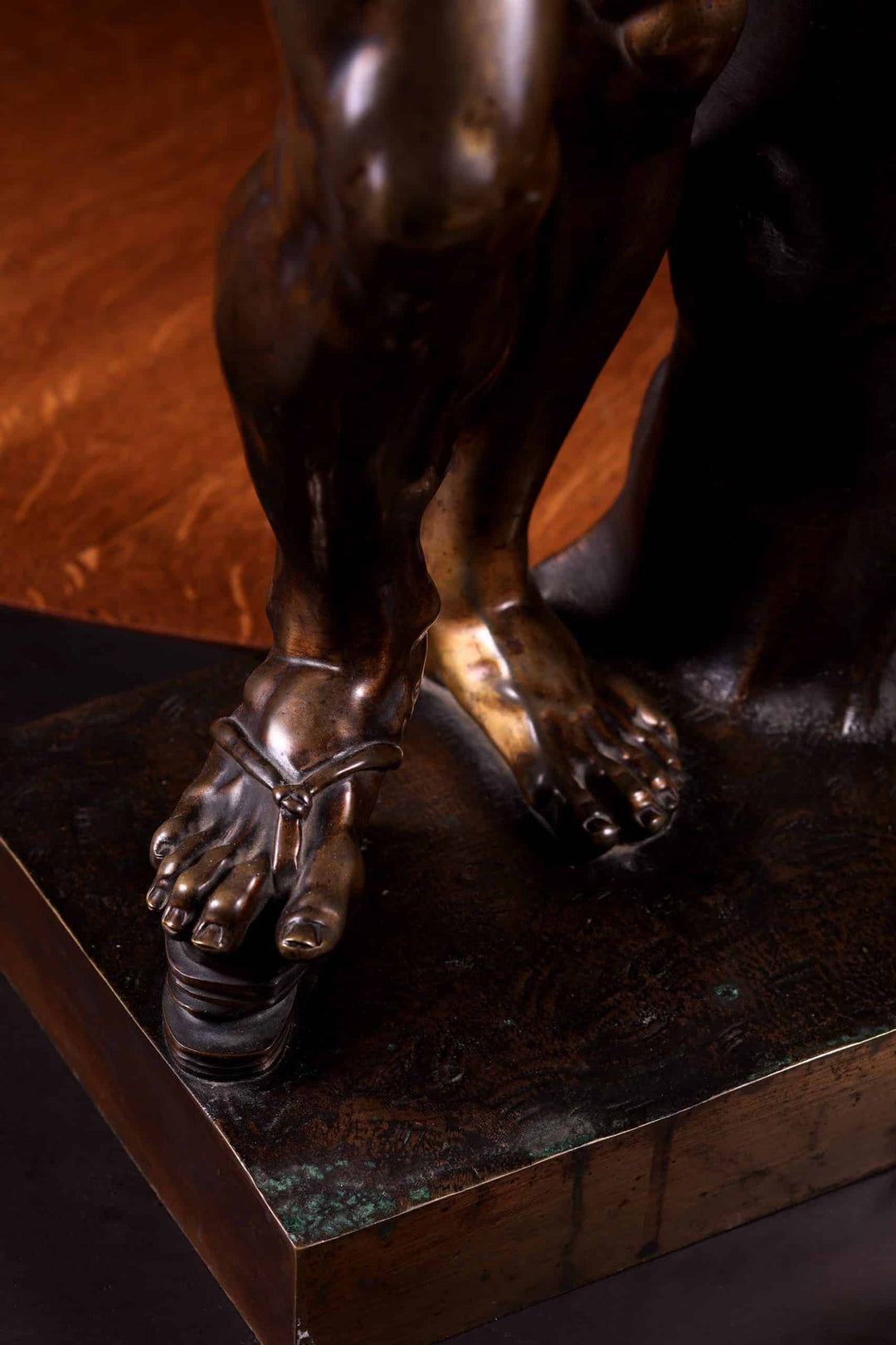 Bacchanalian Bronze Faun After Soldani close-up of bronze sculpture feet on bronze base, antique Italian artwork circa 1800