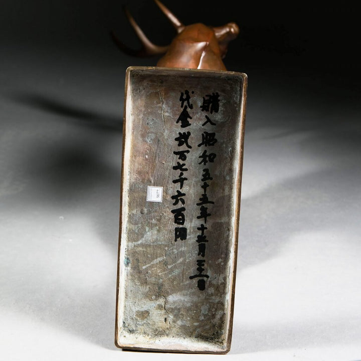 A Japanese bronze model of a Stag