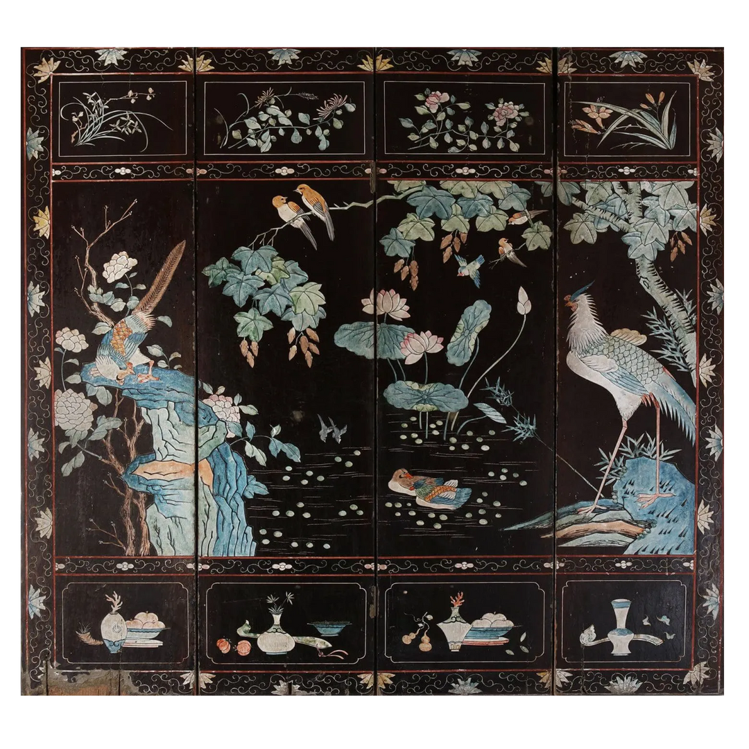 An early 19th century four fold Chinese lacquer screen