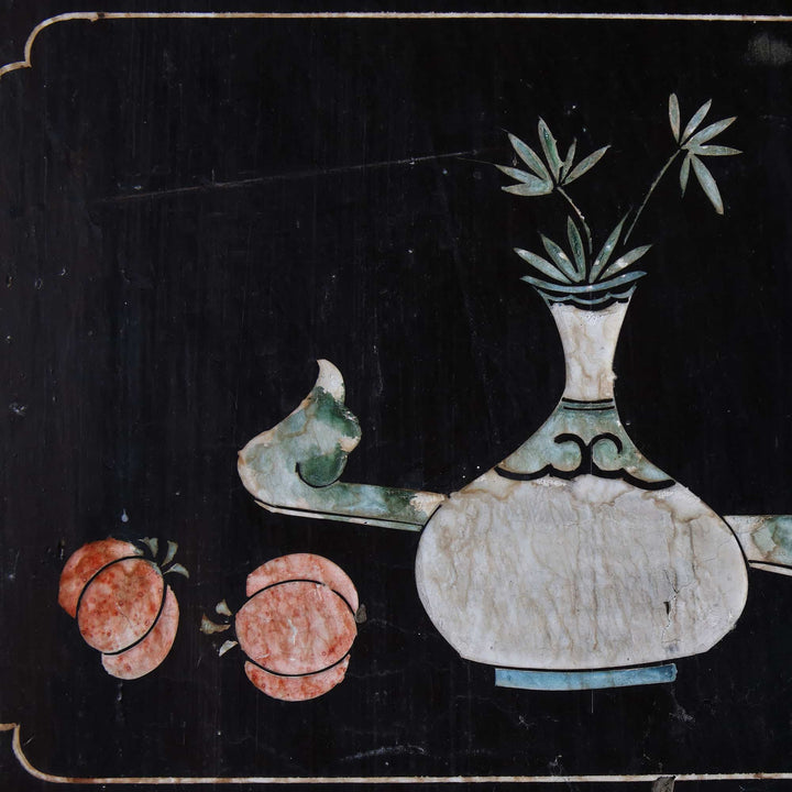 An early 19th century four fold Chinese lacquer screen