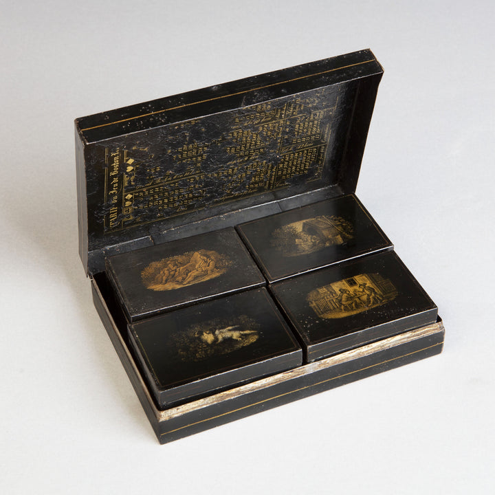 A tole games box and counters for Boston Russe