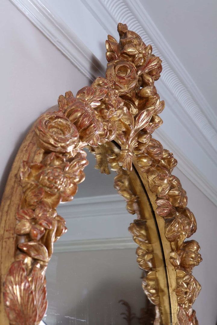 19th Century Giltwood Overmantel Mirror with intricate carved floral giltwood frame from France circa 1875.