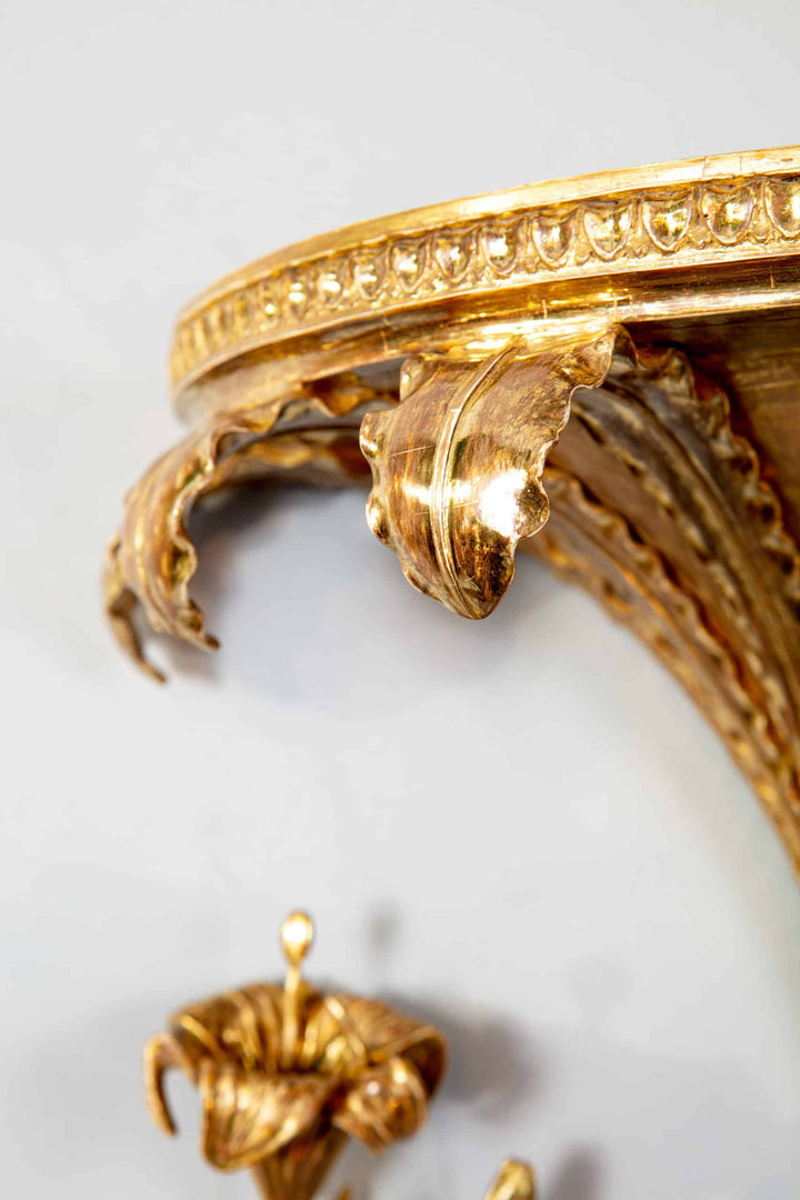 A pair of George III giltwood Lily wall-brackets