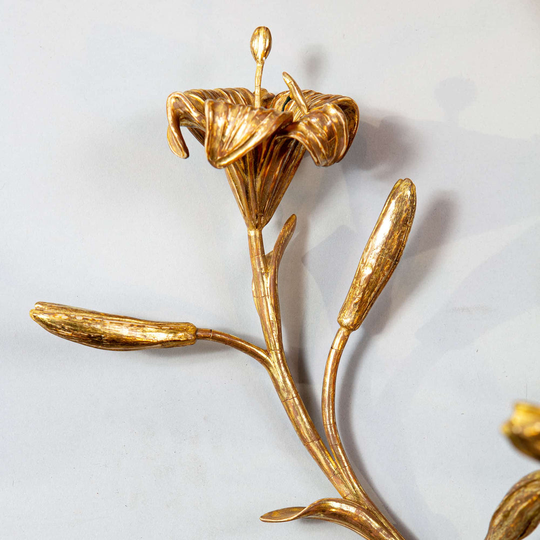 A pair of George III giltwood Lily wall-brackets