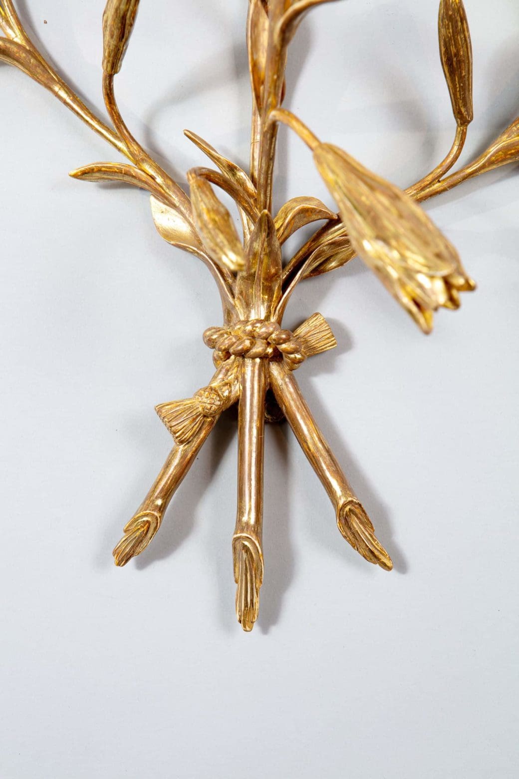 A pair of George III giltwood Lily wall-brackets