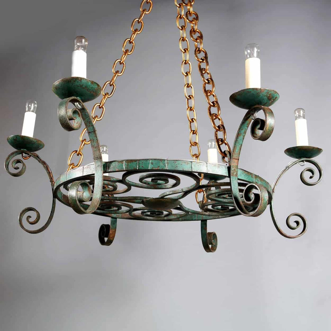 A French bronze patinated iron modernist crown chandelier