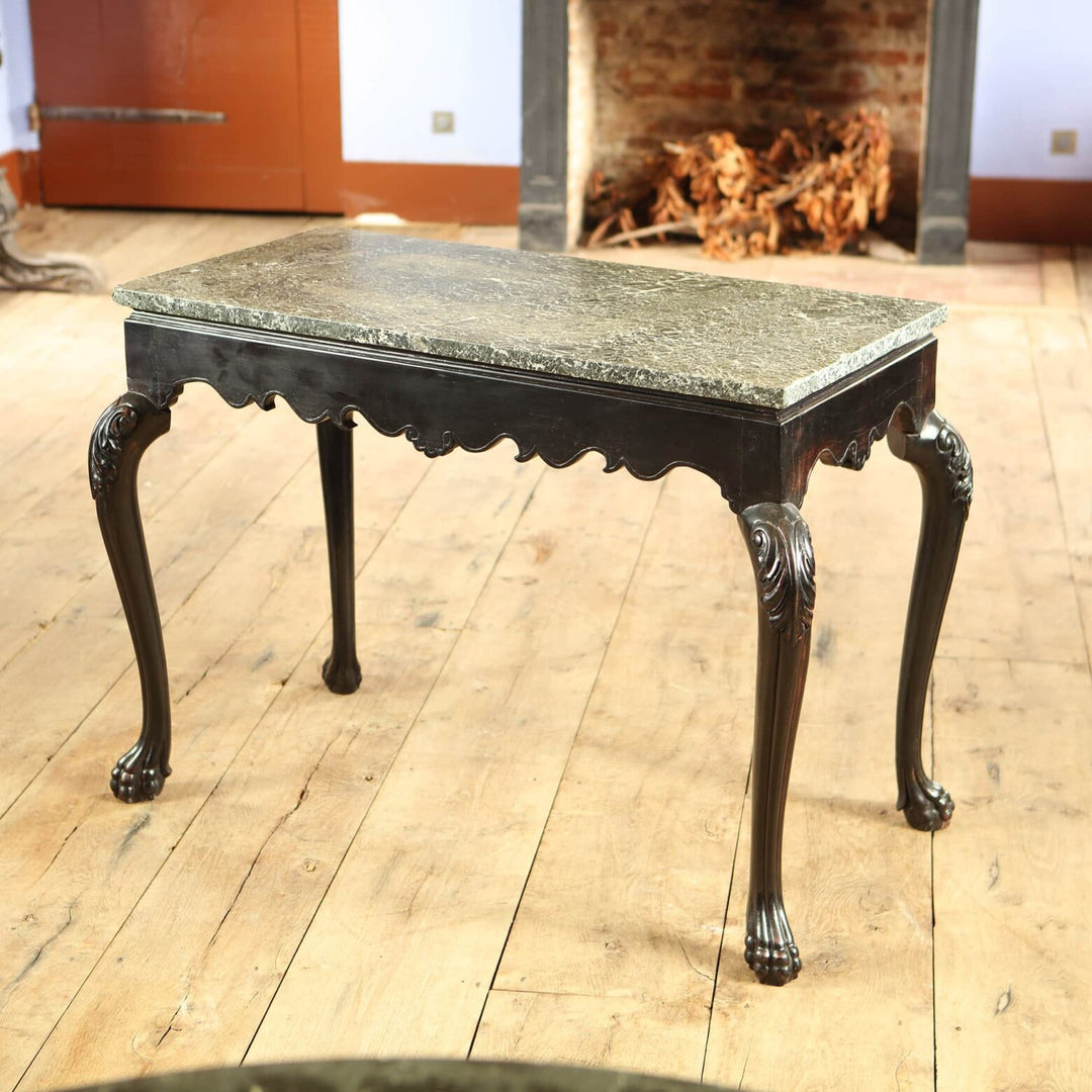 Anglo Indian Ebonised Centre table with green marble top, cabriole legs, acanthus knees, and paw feet circa 1850.
