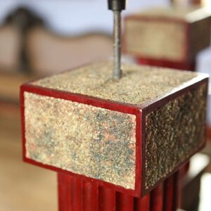 Pair of Red Lacquered and Sanded Column Lamps with gilt sand inset panels by Andrew Allfree circa 2000, France.