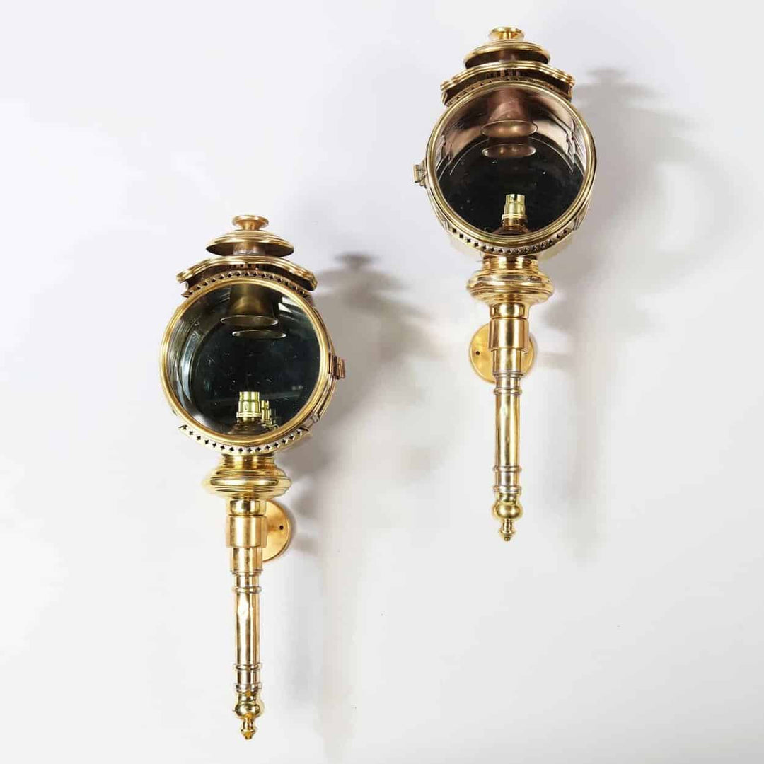 A pair of brass carriage lamps