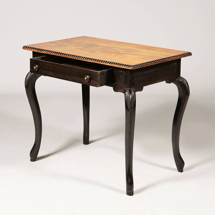 Pair of Antique Ceylonese Side Tables with satinwood tops, ebony cabriole legs, carved foliate details, and single drawer.