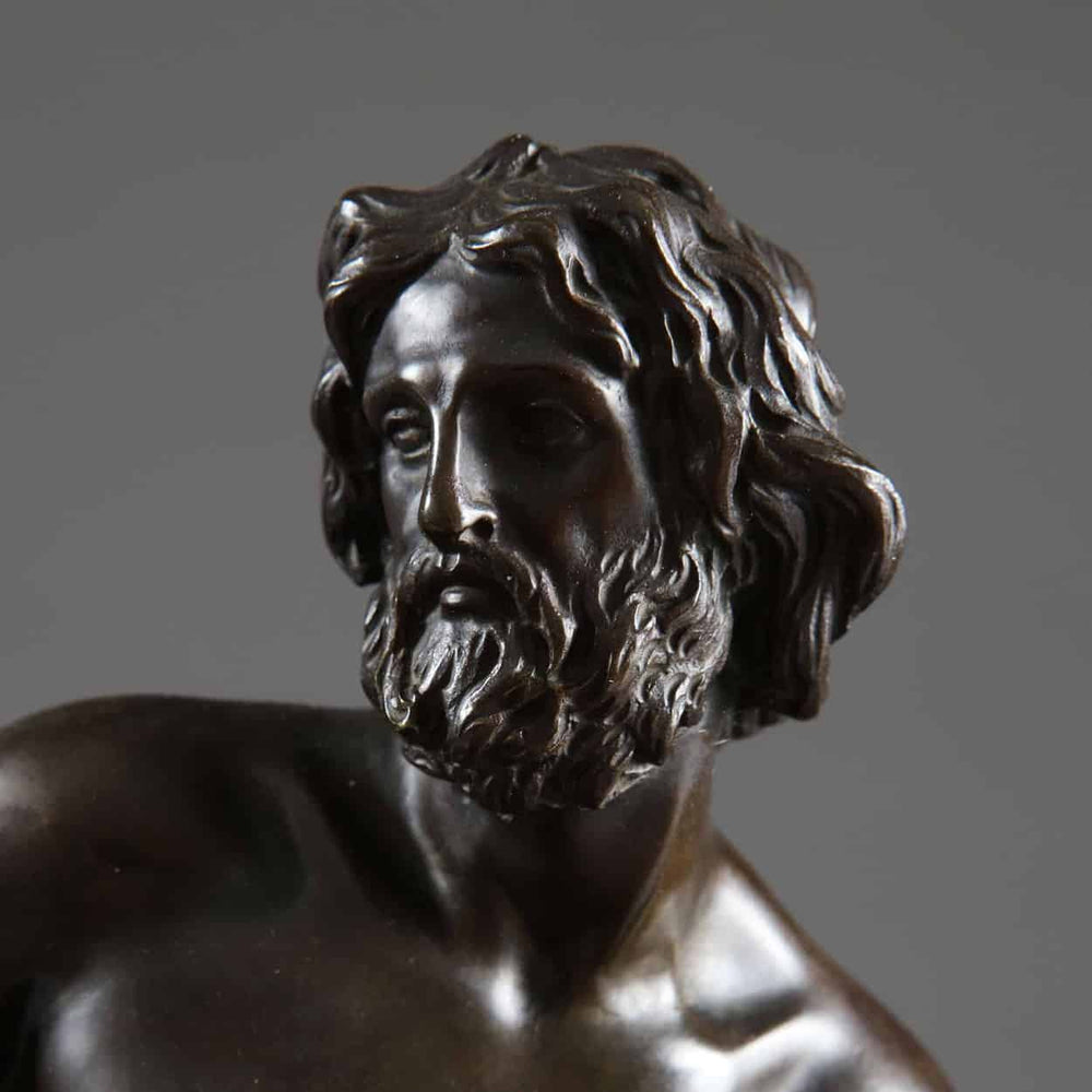 Antique Bronze Statue of Zeus riding an Eagle, detailed 19th-century bronze sculpture of Zeus with textured hair and beard.