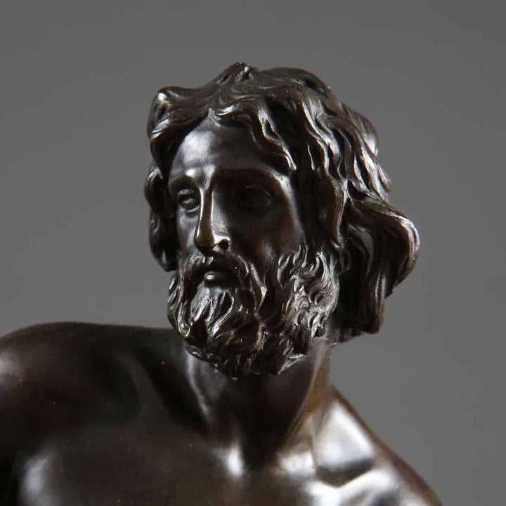 Antique Bronze Statue of Zeus riding an Eagle, detailed 19th-century bronze sculpture of Zeus with textured hair and beard.