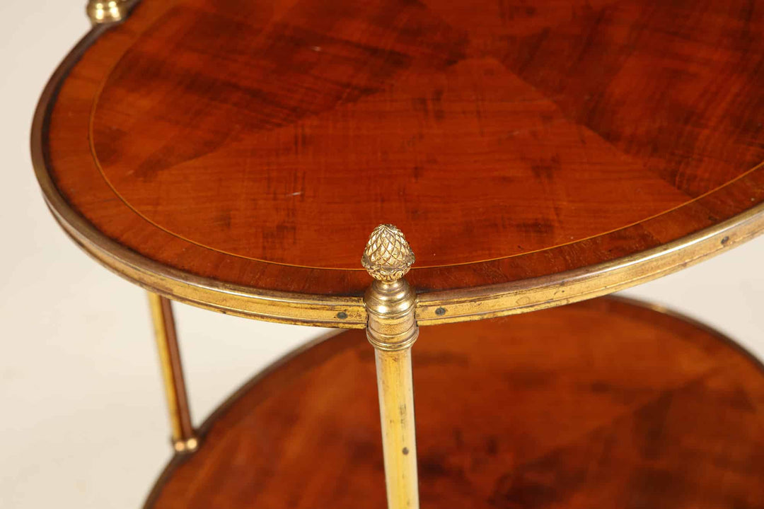 Quarter Veneered Bookmatched Mahogany Oval 2 Tier Table with gold detailing, circa 1910, English antique wooden side table.