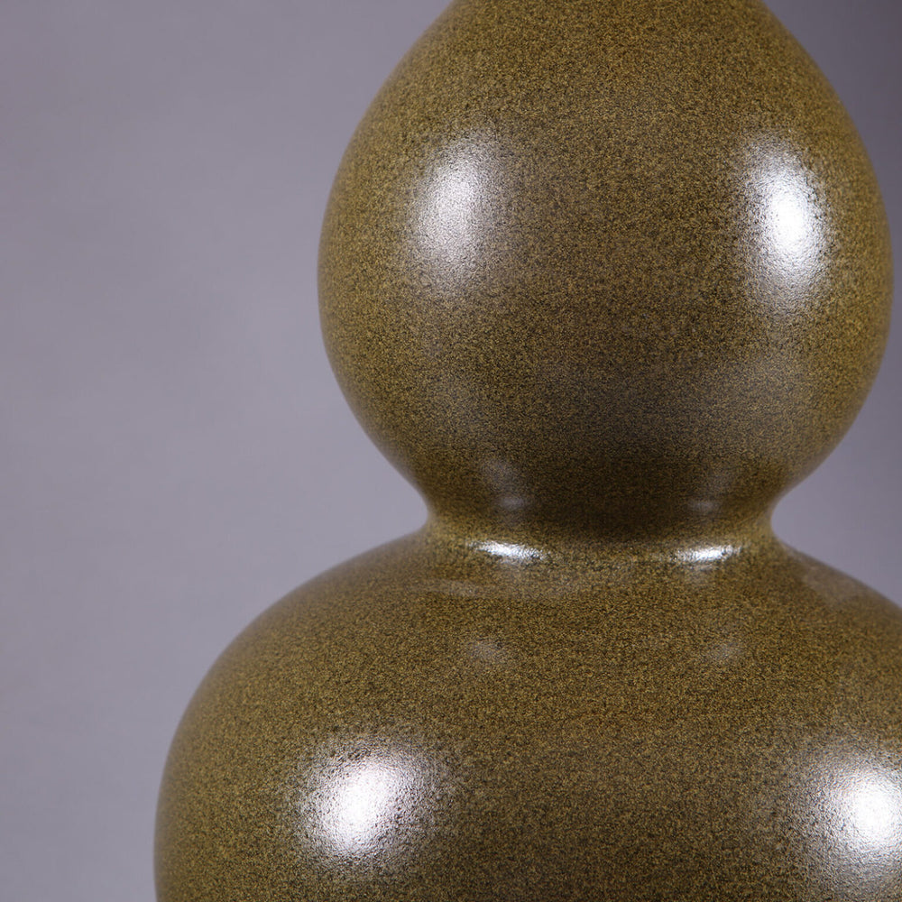 Pair of speckled green double gourd vase lamps with a glossy finish and rounded silhouette on a neutral background.