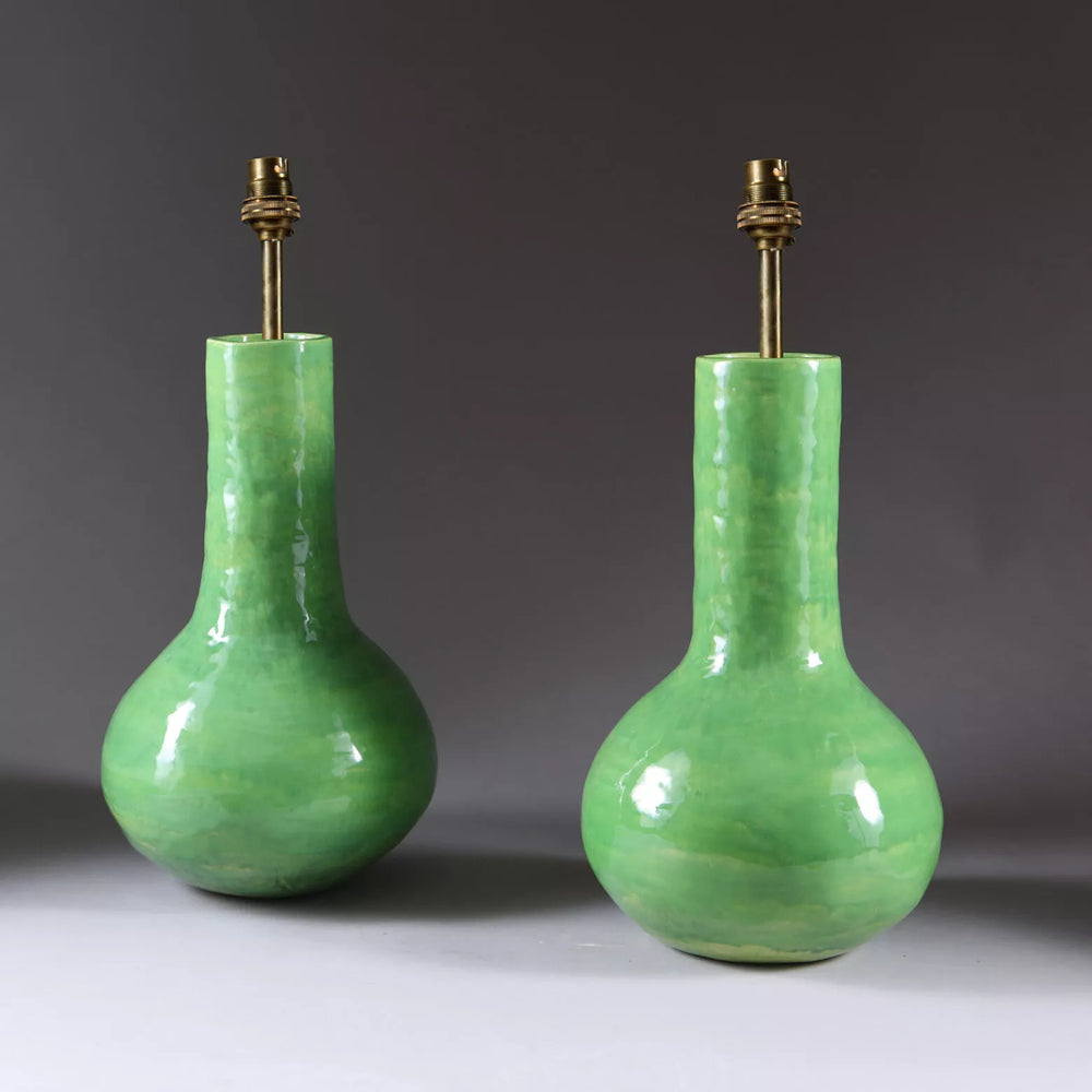 Pair of green vase lamps with a glossy glaze finish, designed by Andrew Allfree, 38 cm high and 21 cm diameter.