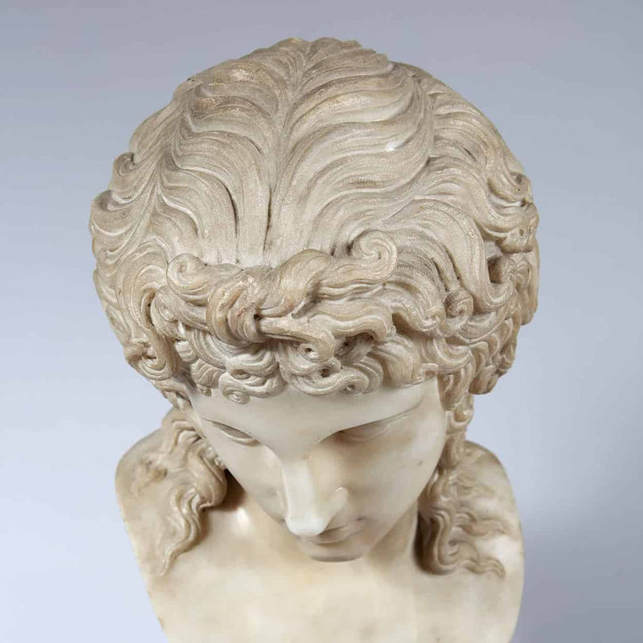 Eros Di Centocelle marble bust with detailed curly hair, antique style on Siena marble plinth, circa 1800 Italy.