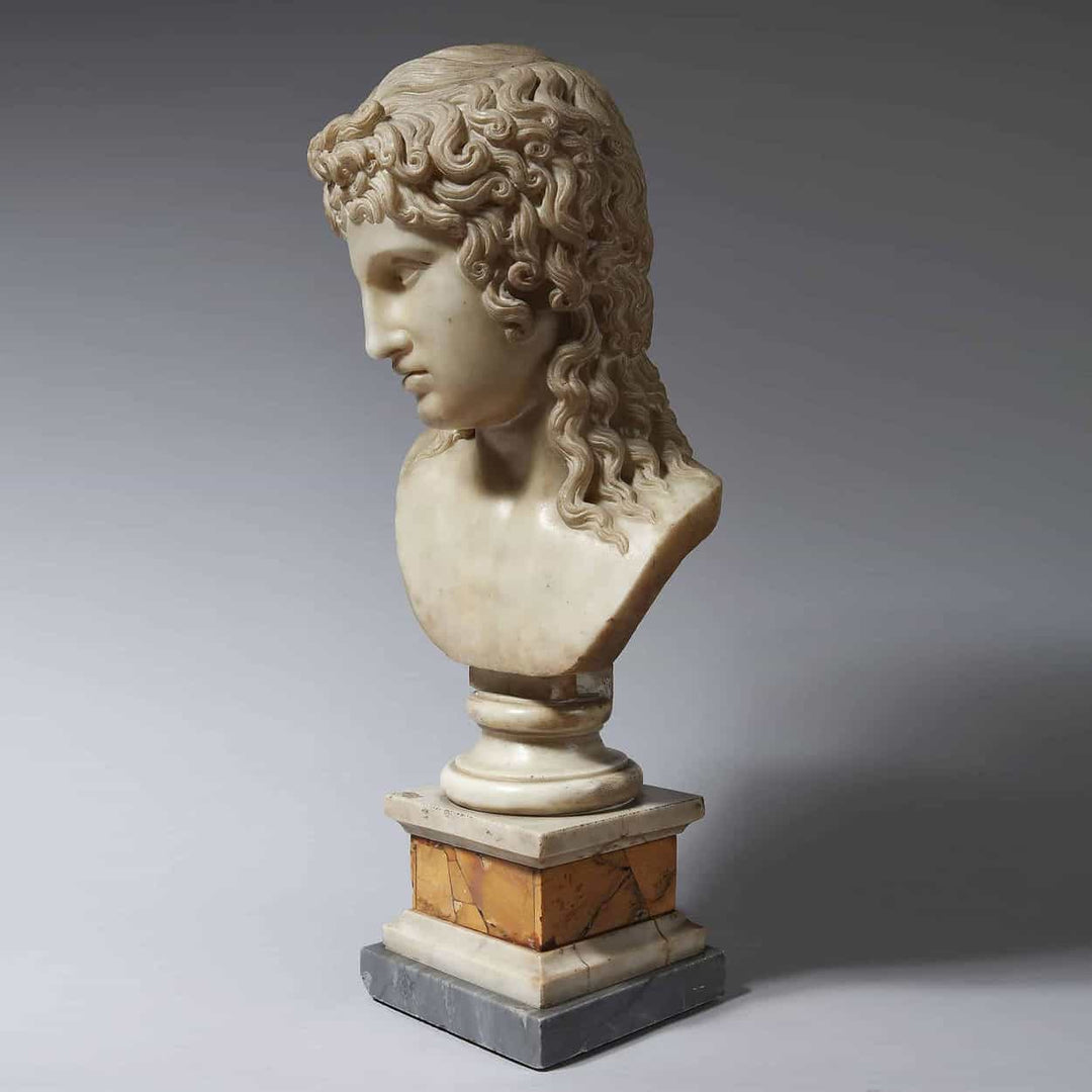 Eros Di Centocelle marble bust on Siena marble plinth, antique style, circa 1800, 63 cm height.