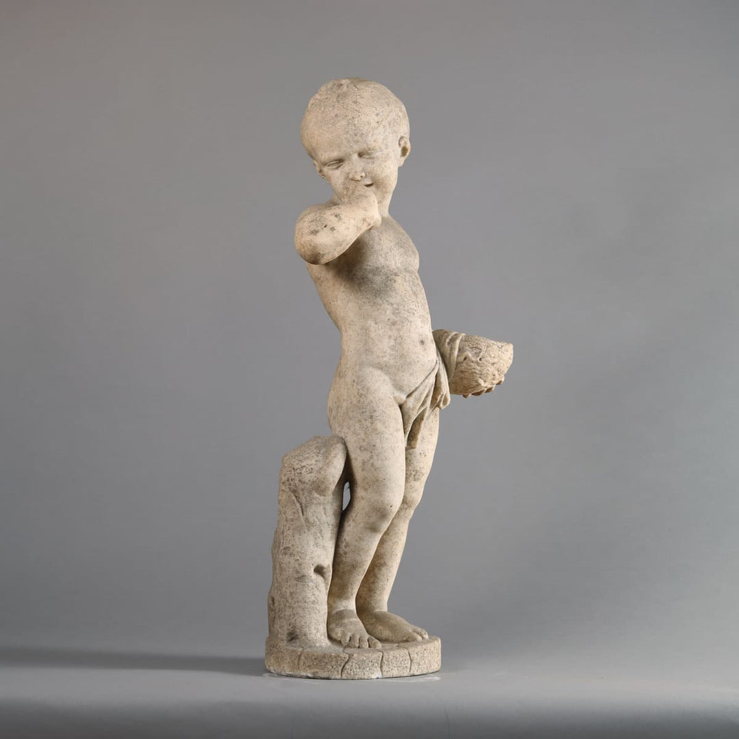 Statue of A young girl holding a birds nest after Bridan