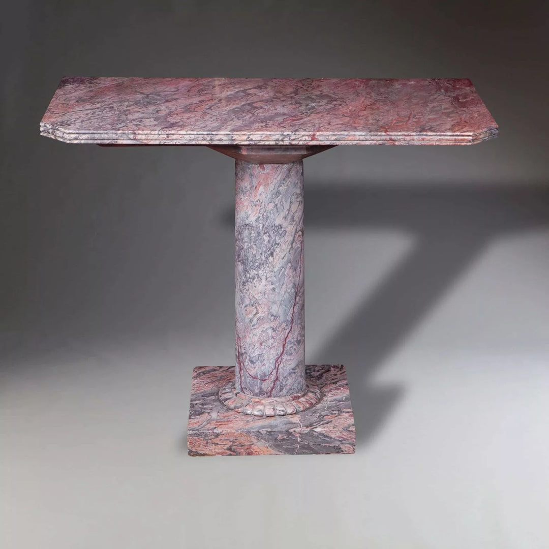 Substantial marble Console Table with rectangular top, fluted border, solid column and base in figured marble.