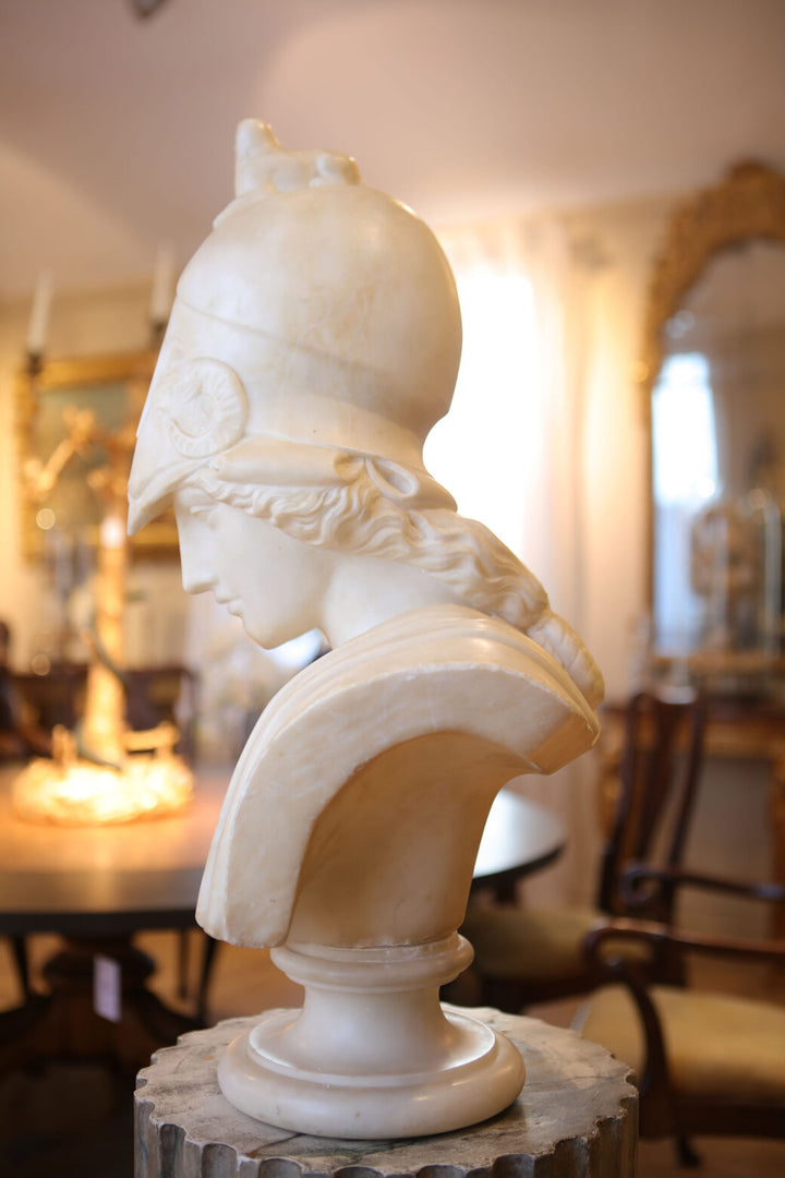 PIETRO BAZZANTI bust of Minerva in alabaster on circular plinth, displayed in elegant vintage interior setting.