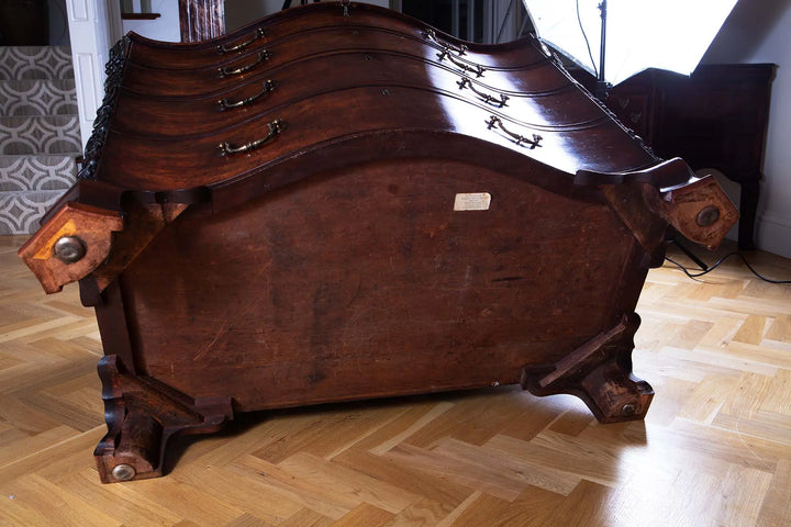 George III Chippendale Mahogany Serpentine Commode shown from the underside with carved ogee bracket feet.