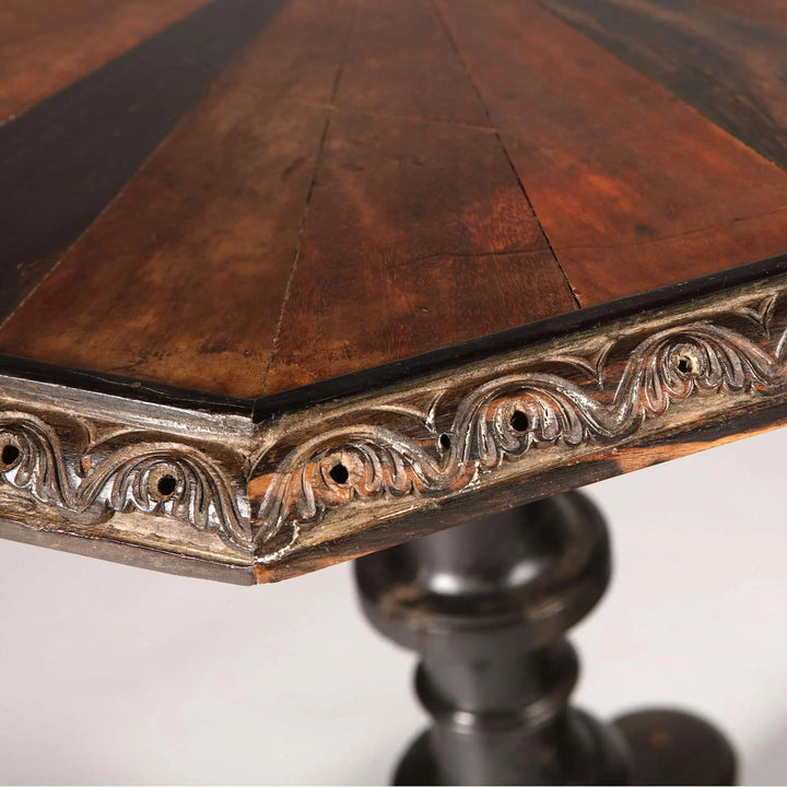 Ceylonese Specimen Wood Occasional Table with octagonal top, carved calamander border, turned ebony base, 19th century style.