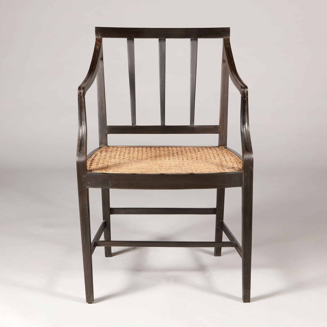 12 Solid Ebony Anglo Indian Dining chairs with Caned Seats
