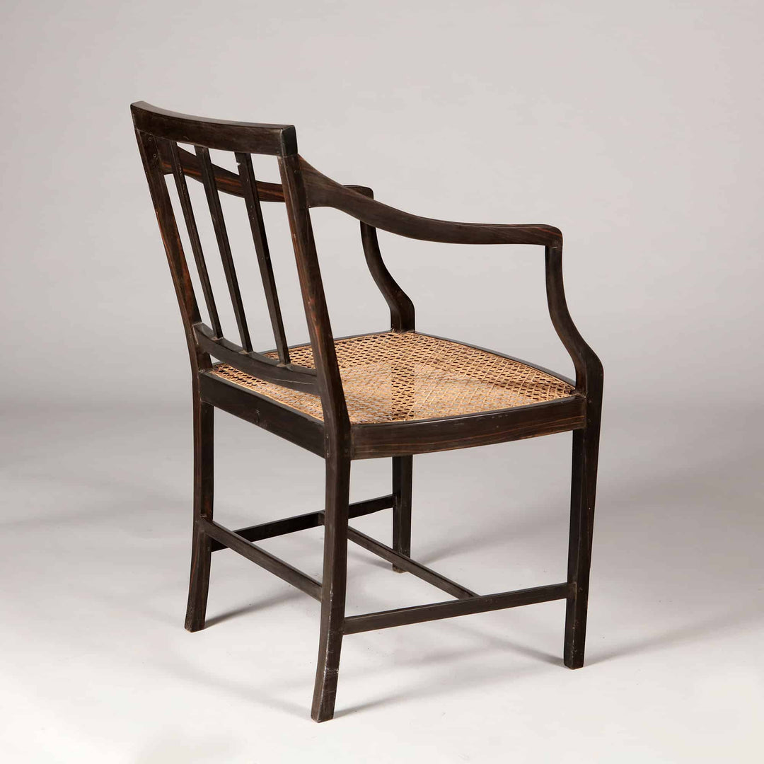 12 Solid Ebony Anglo Indian Dining chairs with Caned Seats