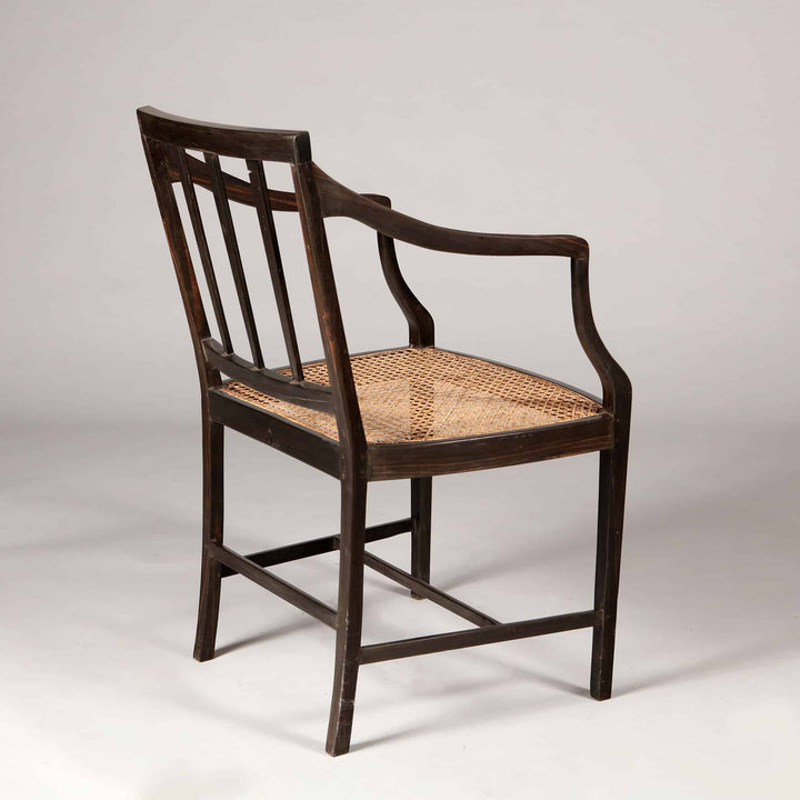 12 Solid Ebony Anglo Indian Dining chairs with Caned Seats