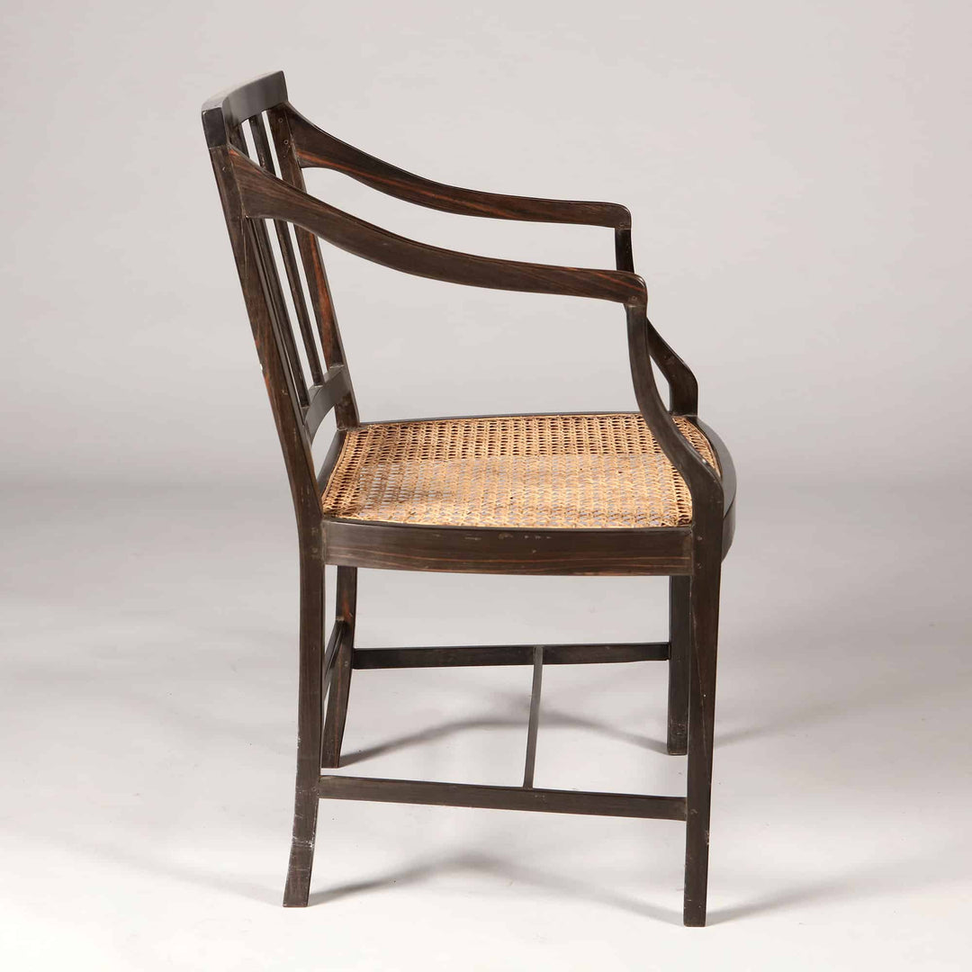 12 Solid Ebony Anglo Indian Dining chairs with Caned Seats