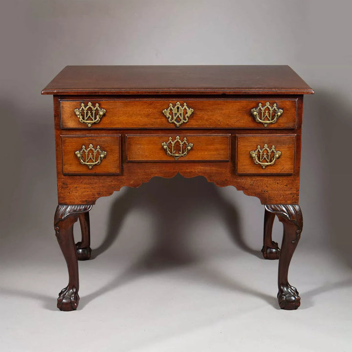 George I Oak Low Boy with thumb molded top, gothic brass handles, ogee apron, and ball claw feet circa 1725 England