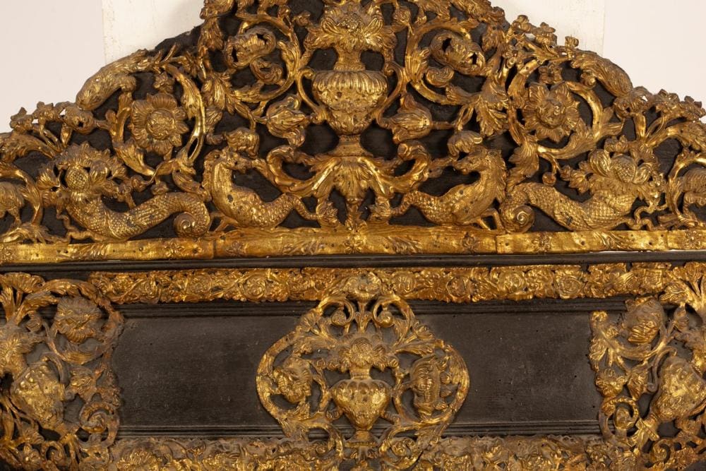 Flemish Wall Mirror with embossed brass decoration, central vase, hippocampi, and cornucopia, Holland circa 1850.